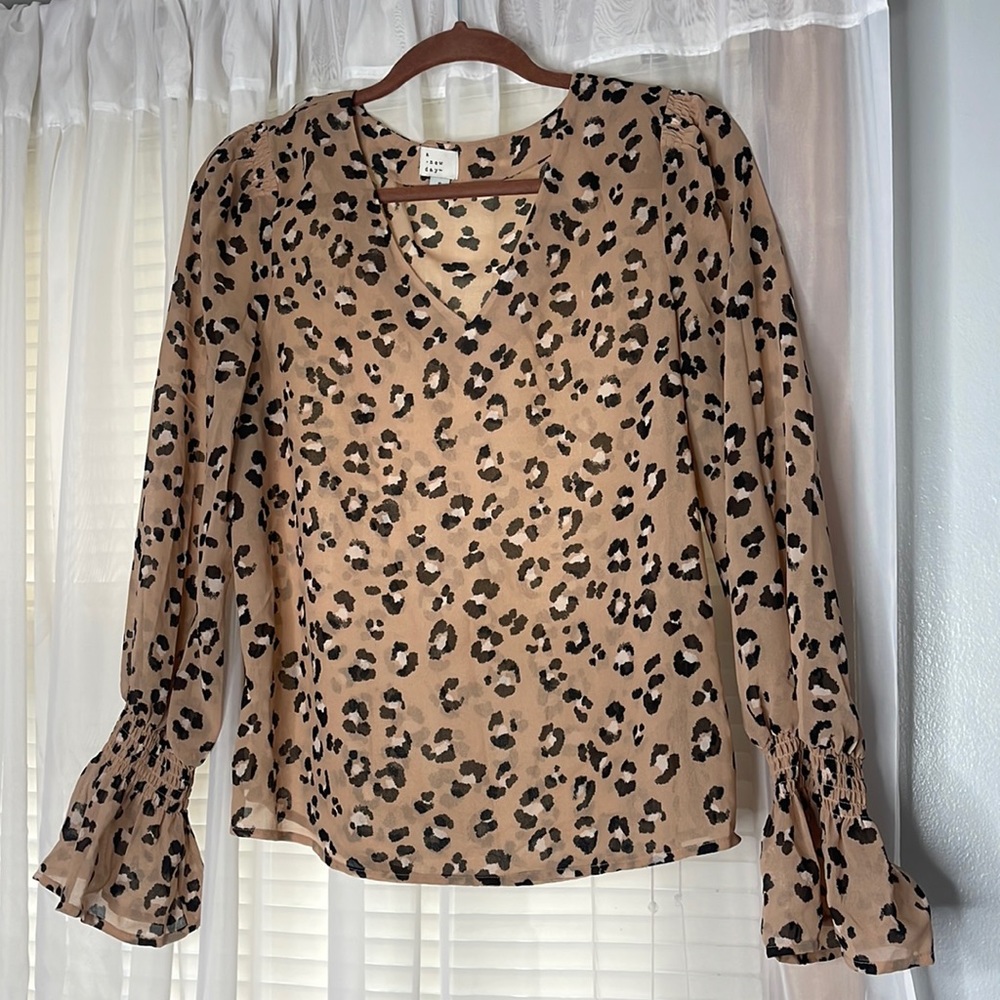 Sheer cheetah print blouse